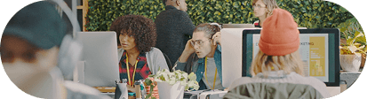 The Guerilla 360 team collaborating in the office