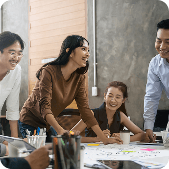 Guerilla 360 team members collaborating in the office