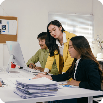 Guerilla 360 team members collaborating in the office